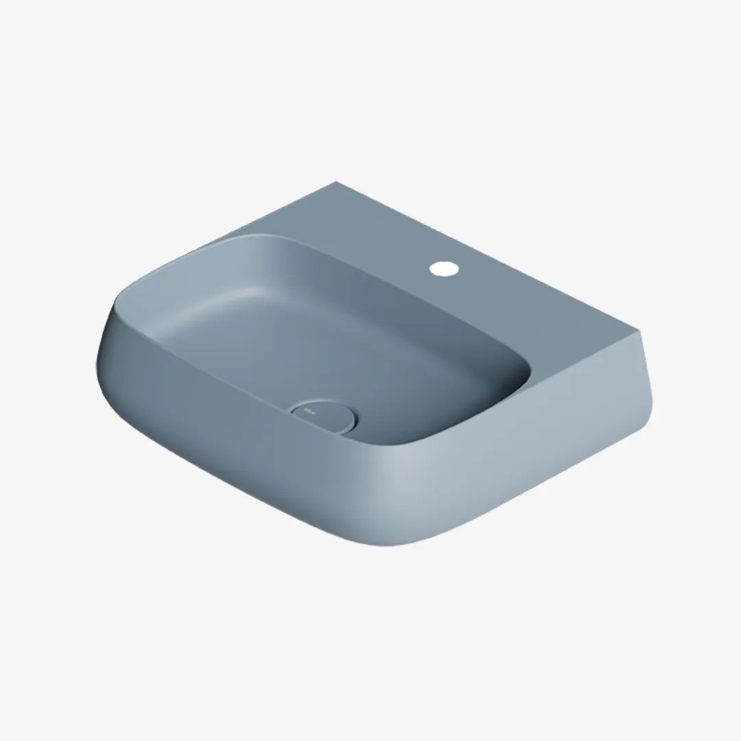 Nur, lavabo da appoggio:sospeso in ceramica celeste opaca 55 x 45 cm di Alice Ceramica