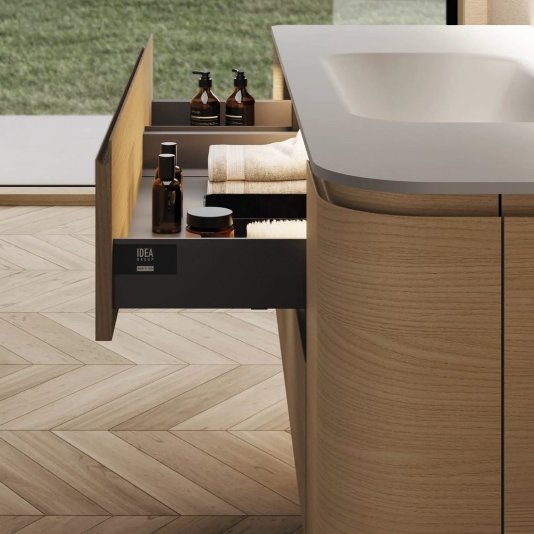 Seventy-Form-02,-mobile-da-bagno-frassino-sbiancato-con-top-curvo-in-Corian®-di-Ideagroup-dett-cass.