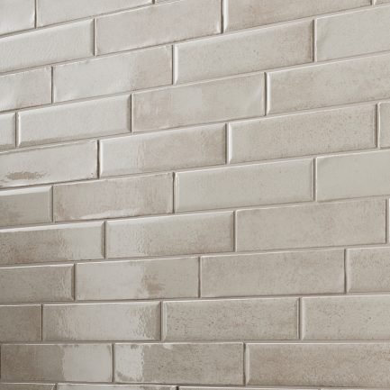 Vibe Bone, rivestimento in gres porcellanato effetto mattoncino lucido 4,8×20 di Rondine